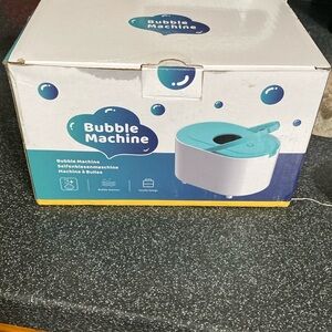 Mathea Bubble Machine, Automatic with Battery, High Output Bubble Maker
